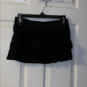 Black mini skirt with ruffles
